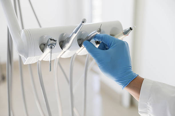 Professional Tooth Extraction technician working in Wichita, KS